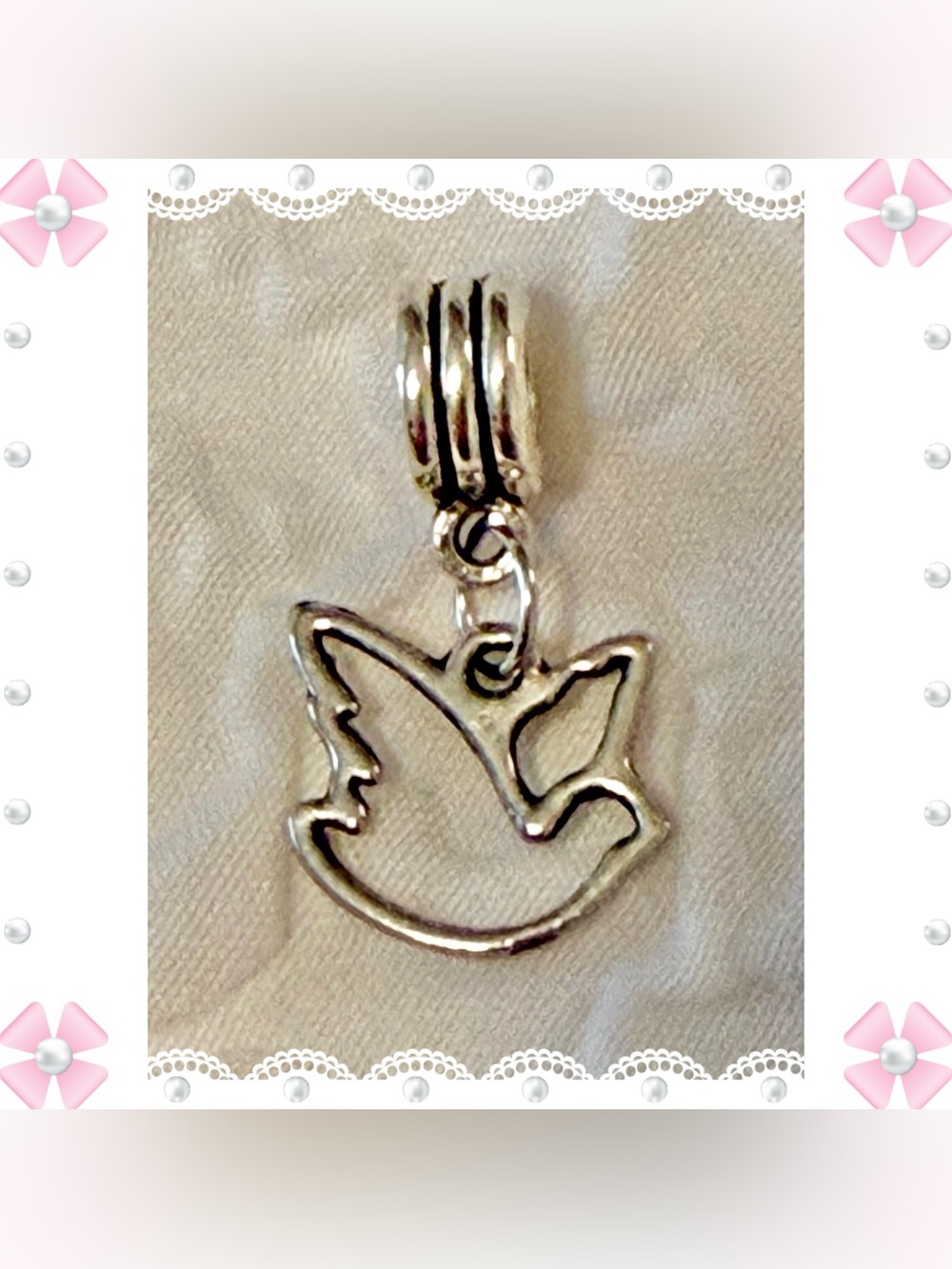Charm / pendant - small cut out peace dove - silver tone stainless steel. New!